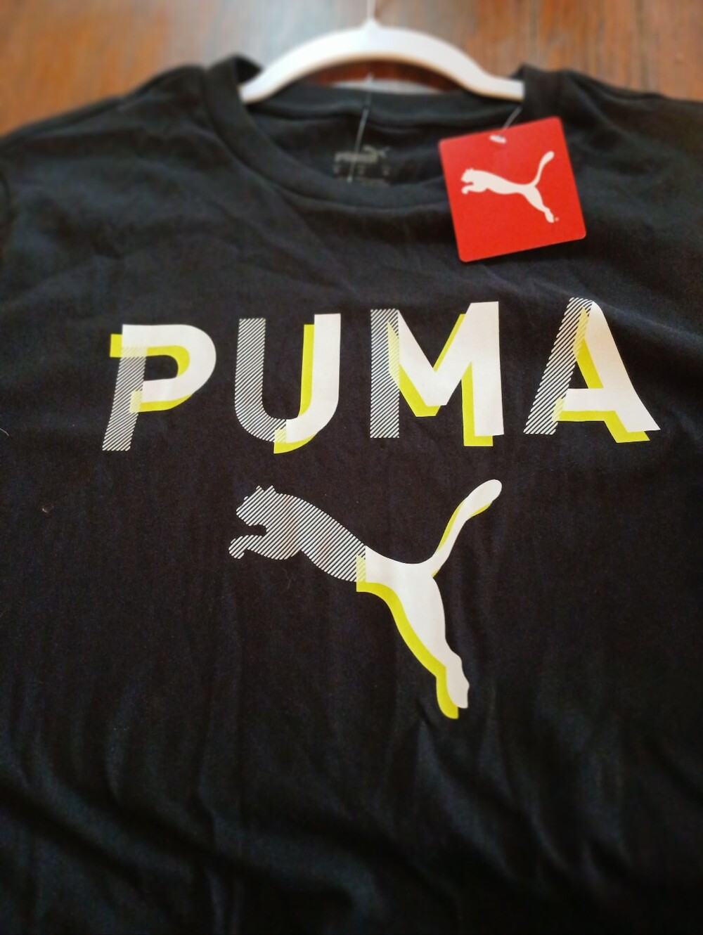 Puma Men’s Black Tee with White and Yellow Logo